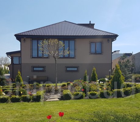 Одноэтажный дом с цокольным этажом в Каменке