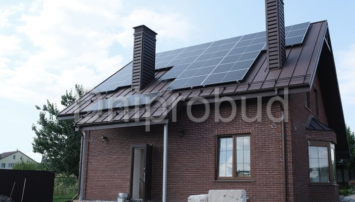 Дом мансардного типа с кирпичной облицовкой в с. Рожны